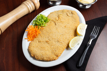 milanesa frita para comer en restaurant
