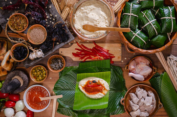 Fototapeta na wymiar Guatemalan tamales, with dough and all its ingredients.