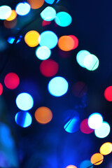 Colorful bokeh on a dark blue background