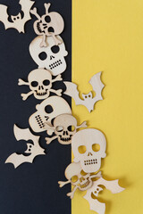 laser cut wooden shapes arranged in a row on a geometric paper background - halloween or pirate theme