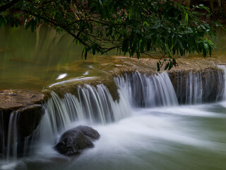 A small waterfall of a swaying stream.