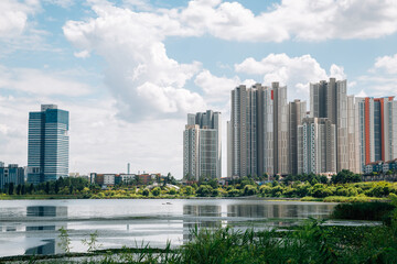 Fototapeta premium Modern buildings and Gwanggyo Lake Park in Suwon, Korea
