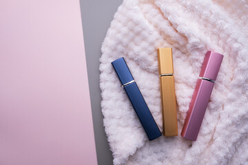 natural cosmetics bottle containers on color paper background, empty bottle ,natural beauty skincare product,  beauty product concept 
