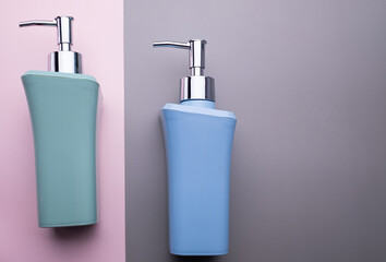 natural cosmetics bottle containers on color paper background, empty bottle ,natural beauty skincare product,  beauty product concept 
