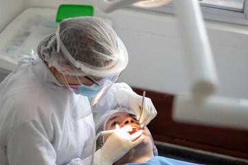 Fototapeta na wymiar a dentist at work, at the dentist, oral health