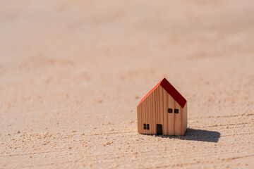 Obraz na płótnie Canvas miniature house model on ground 