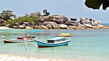 Naklejka na ściany i meble The beauty of Belitung beach with its dazzling white sand. Bangka-Belitung, Indonesia