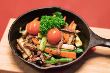 Meat salad with tomatoes, lettuce and carrots.
Healthy lunch menu. Diet food. View from above 