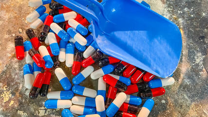 Multi-colored pills at an illegal medical device factory