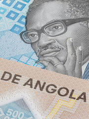 Close up to 500 Kwanza of the Republic of Angola. Polymer banknotes of the African country. Detailed capture of the front art design. Detailed money background wallpaper. Currency bank note Kwanzas - obrazy, fototapety, plakaty