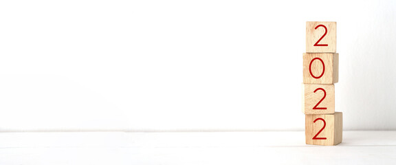 2022 on wood cube block over white background with copy space for text, Happy new year 2022...