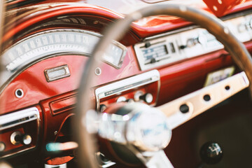 Classic car show, close-up on vehicle dashboard, vintage color