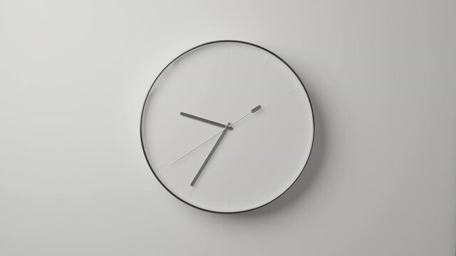 Clock Face on White Office Wall in Timelapse