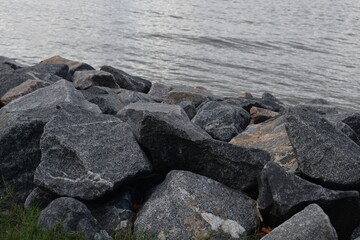 Fototapeta na wymiar Rocks by the river, near sea