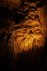 Fototapeta na wymiar Detail of the stalagmite in the cave. 