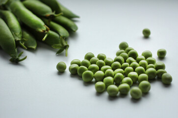 Fresh green peas in a pod and with peas