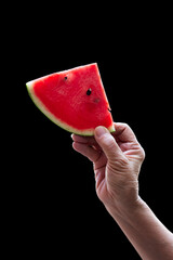 Watermelon slice fruit in hand