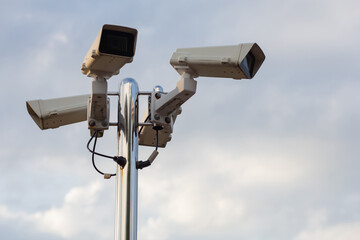 CCTV street cameras on pole. 3D render illustration