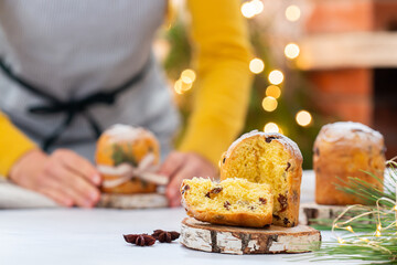 Traditional Italian Christmas cake Panettone with festive decorations 
