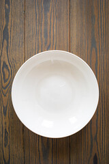 Empty bowl on wooden table
