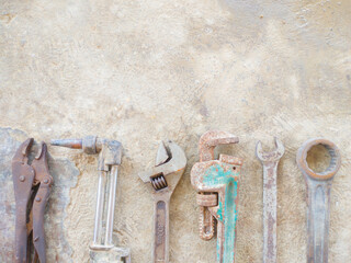 mechanical work equipment on cement floor, for copy space labor day