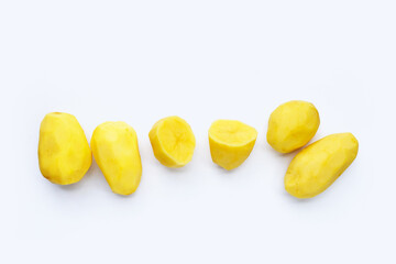Raw peeled potatoes on white background
