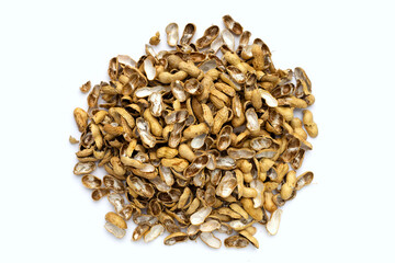 Pile of peanut shells on white