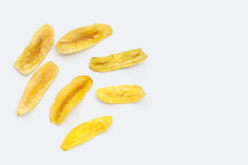 Banana slice chips on white background