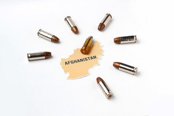 Afghanistan map logo icon with real gun bullet ammo around country on white background in concept...