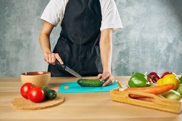 Cook woman lunch at home vegetarian food cutting board