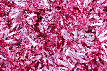 Pink shiny sparkling tinsel background, texture, wallpaper, backdrop