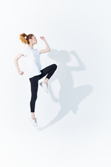 Fototapeta na wymiar woman in sports uniform energy lifestyle studio fitness