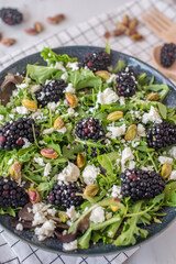 healthy summer salad with berries and feta cheese