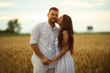 Happy young couple enjoying beautiful nature together