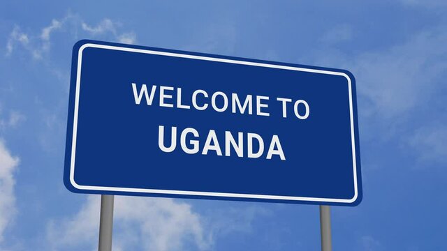 Welcome to Uganda Road Sign on Clear Blue Sky with Rapid Moving Clouds
