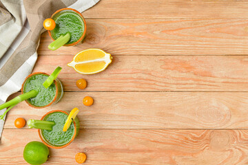 Glasses of bloody Mary cocktail on wooden background