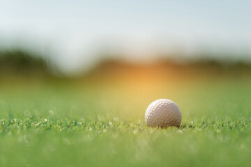 Golf balls on artificial grass with blur background
