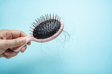 A comb and falling hair