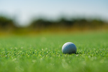 Golf balls on artificial grass with blur background
