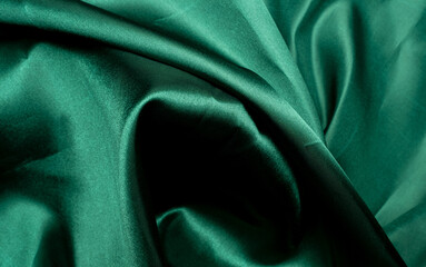 green fabric texture background, abstract, closeup texture of cloth
