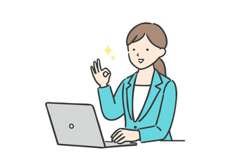 ノートパソコンを操作しながらOKサインをするビジネスウーマン 