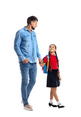 Little schoolgirl with her father on white background
