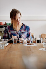 Woman barista at coffee cupping