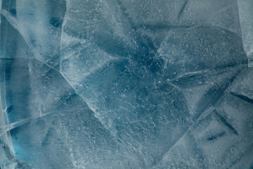 Ice texture with small round air bubbles trapped inside 
