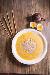 traditional chinese teo chew hot yam taro sweet paste ou nei with mango sago coconut cream sauce on wood background asian halal dessert menu