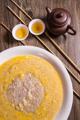 traditional chinese teo chew hot yam taro sweet hot paste ou nei with mango sago coconut cream sauce on wood background asian cafe cuisine Chinese restaurant banquet halal food menu