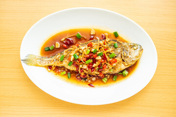 Chinese cuisine a braised yellow croaker