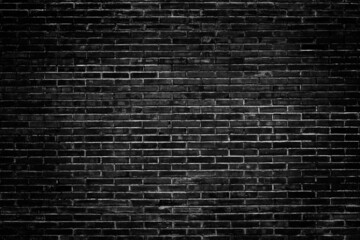 Black brick wall texture for pattern background.