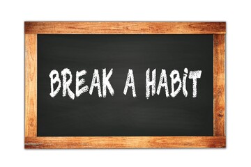 BREAK  A  HABIT text written on wooden frame school blackboard.