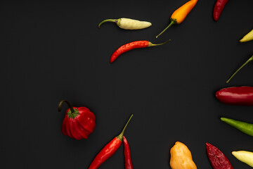 Some pepper on black background
